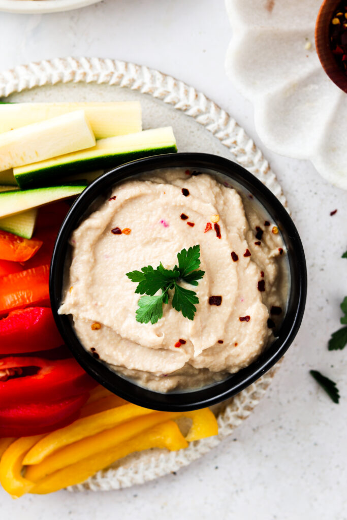 whole30 hummus in a bowl with vegetables