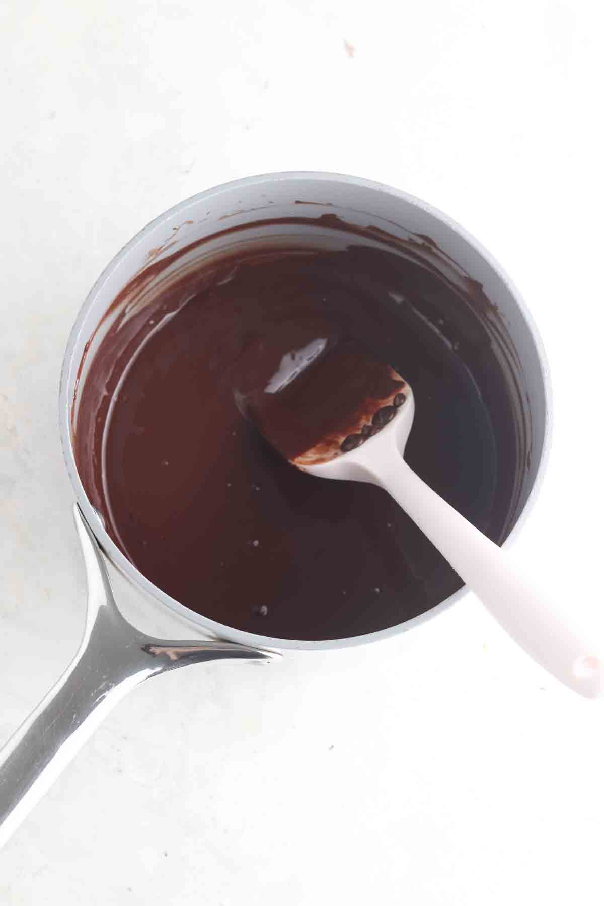 Chocolate and milk melted in a a sauce pan.