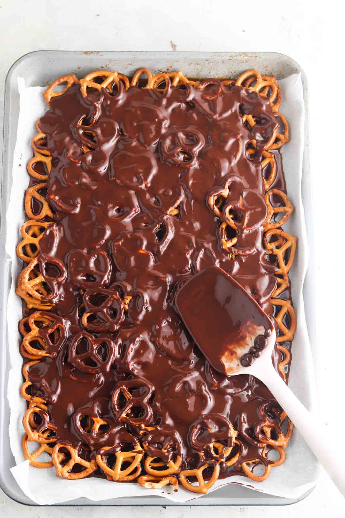 Chocolate and caramel sauce poured over the pretzels. 