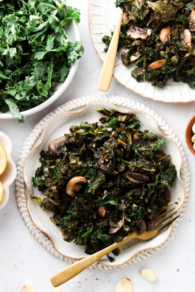 kale and mushrooms in bowls