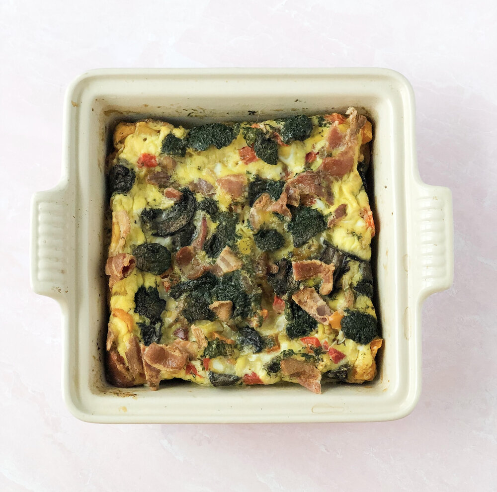 egg frittata in white square casserole dish