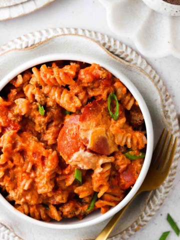 paleo pizza casserole in a bowl with turkey pepperoni