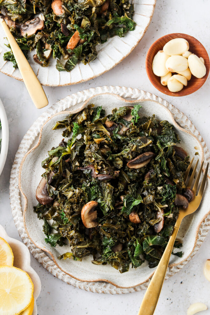 kale and mushrooms on a pretty plate