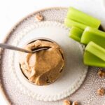 overhead shot of tigernut butter in a cup