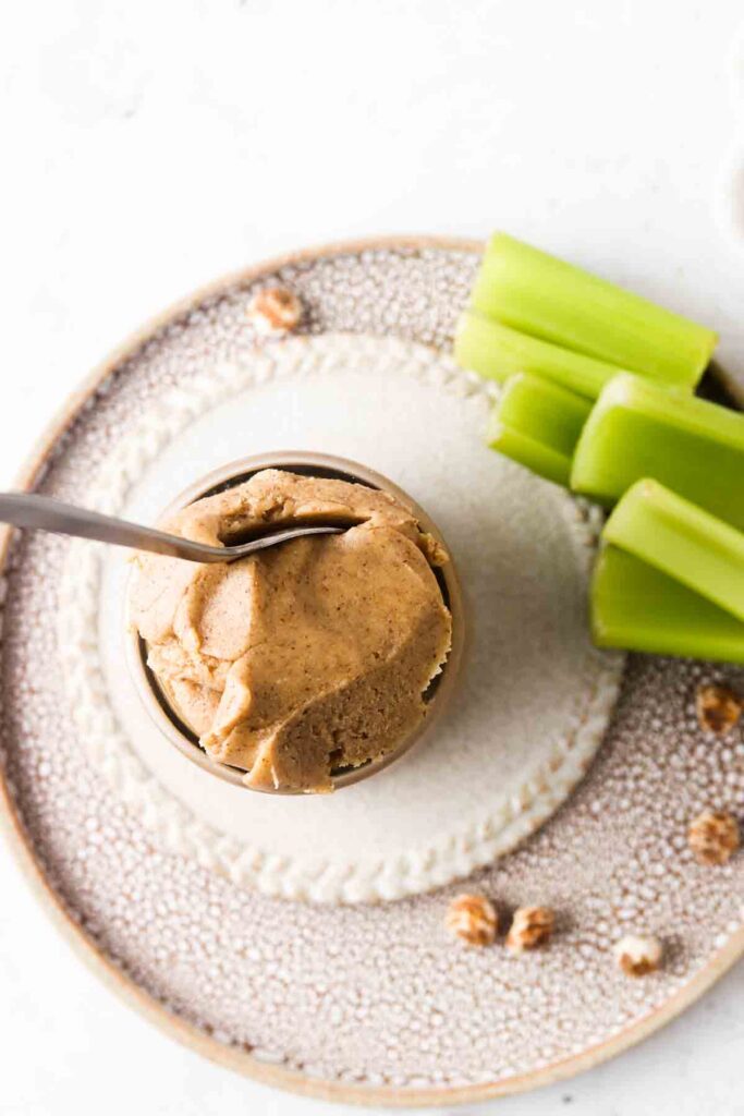 overhead shot of tigernut butter in a cup