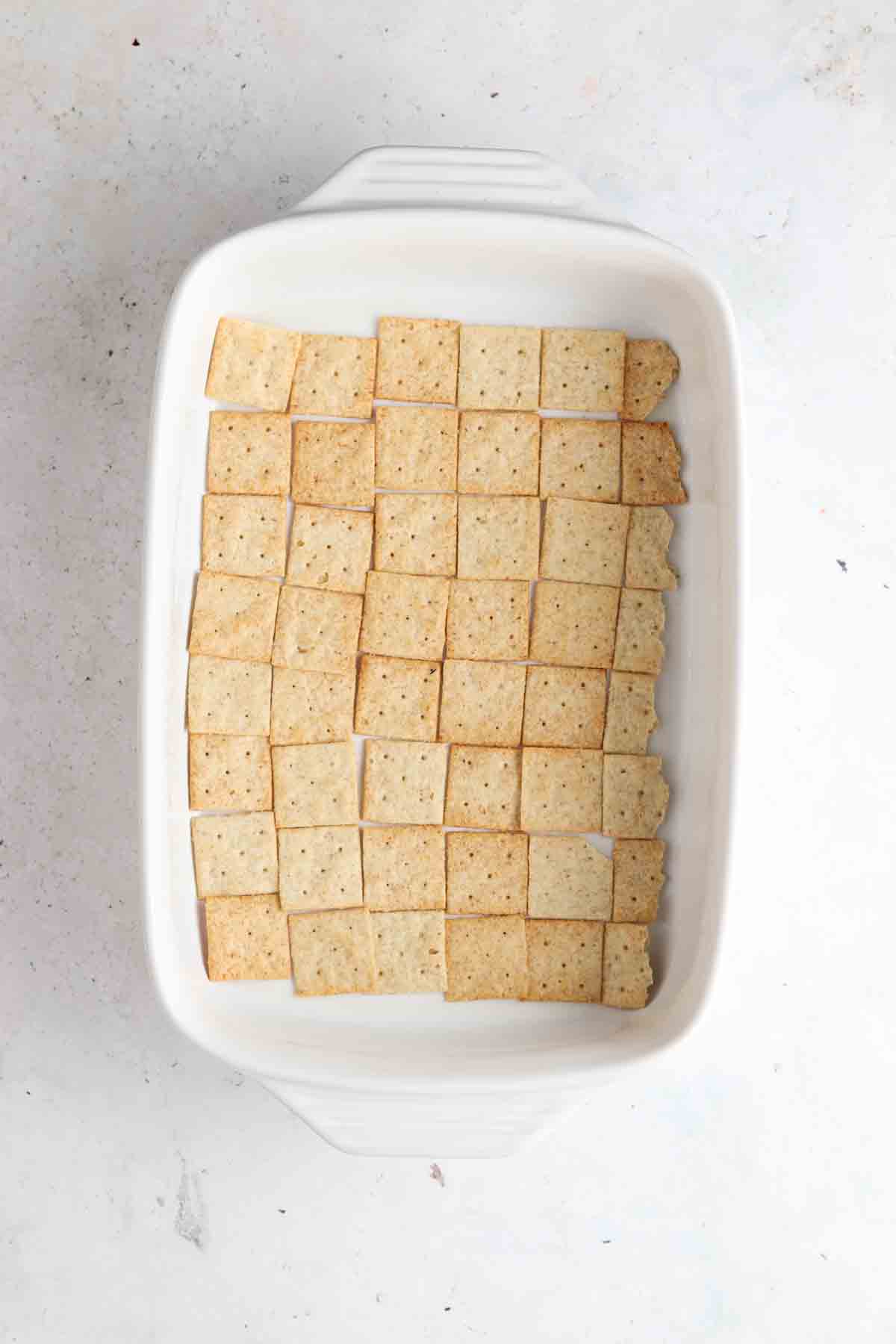 Almond flour crackers in a white baking dish.