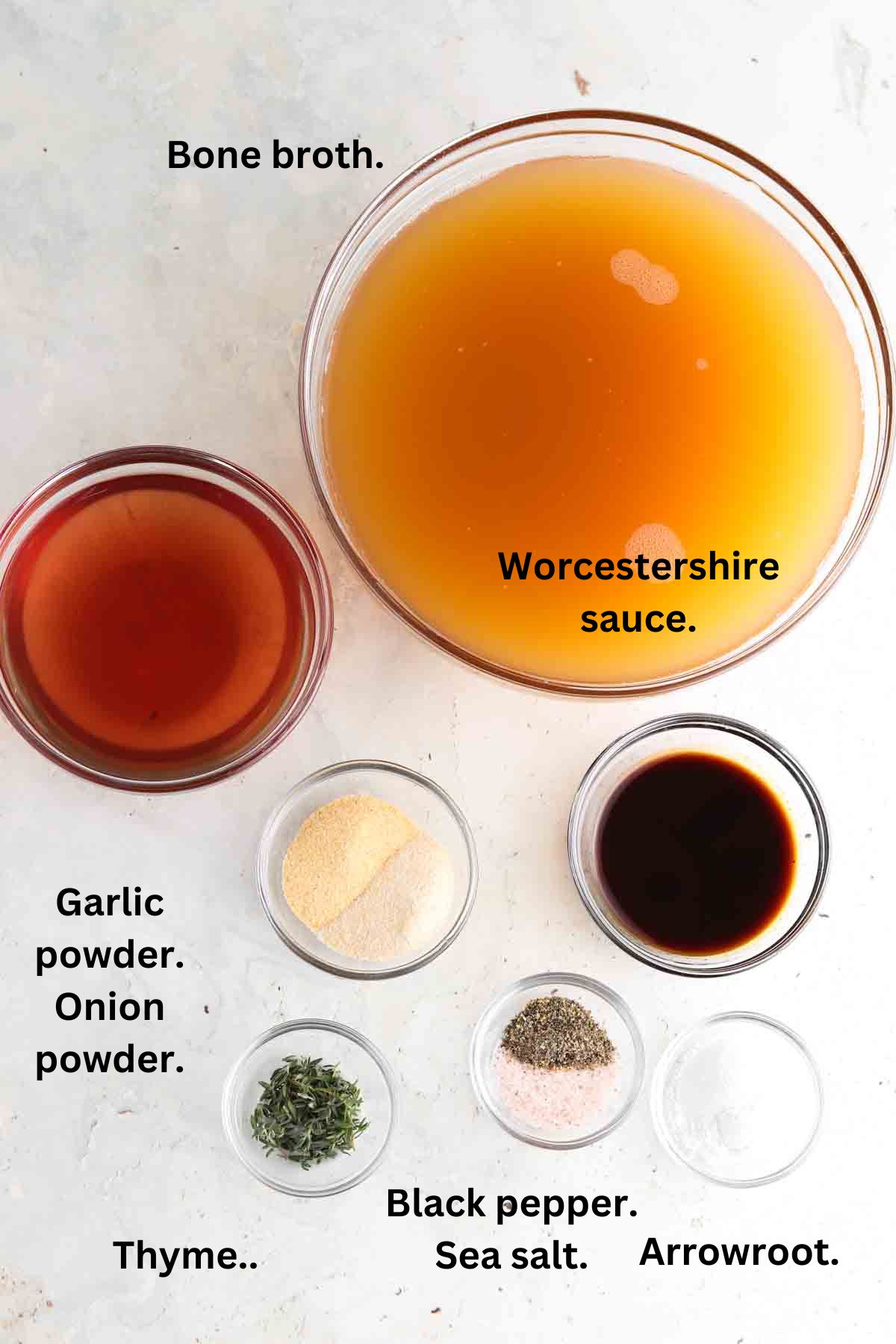 Gravy ingredients laid out on the counter in small glass bowls.