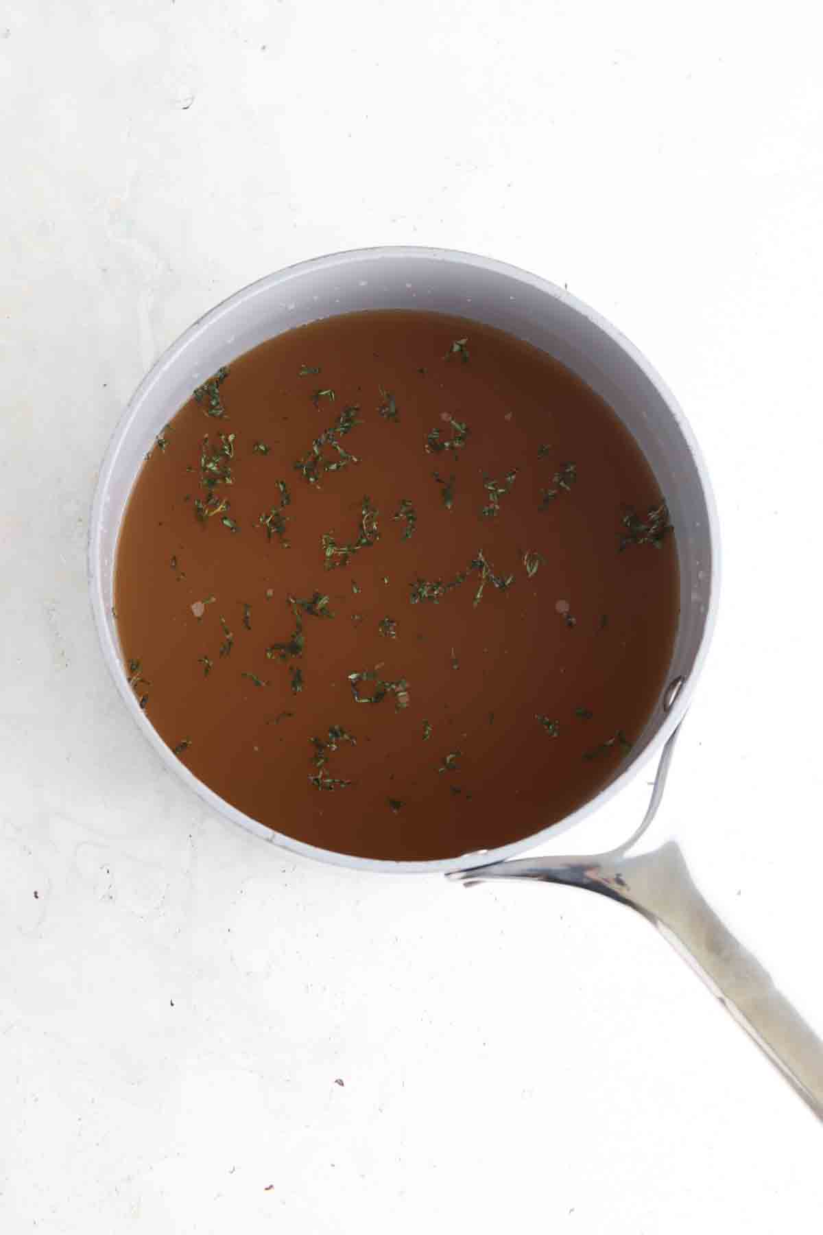 Gravy ingredients in a large sauce pot.