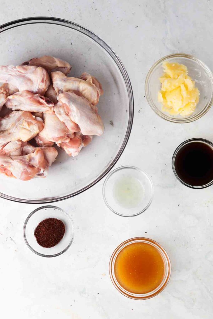 chicken wing ingredients laid out on a tray