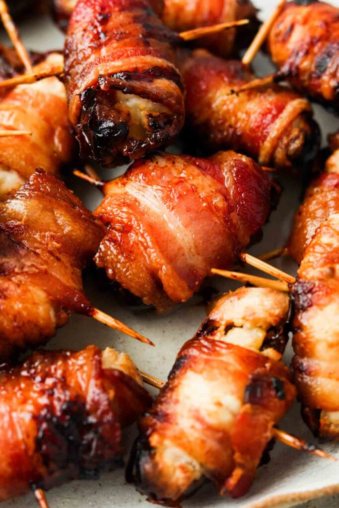 close up shot of bacon wrapped dates