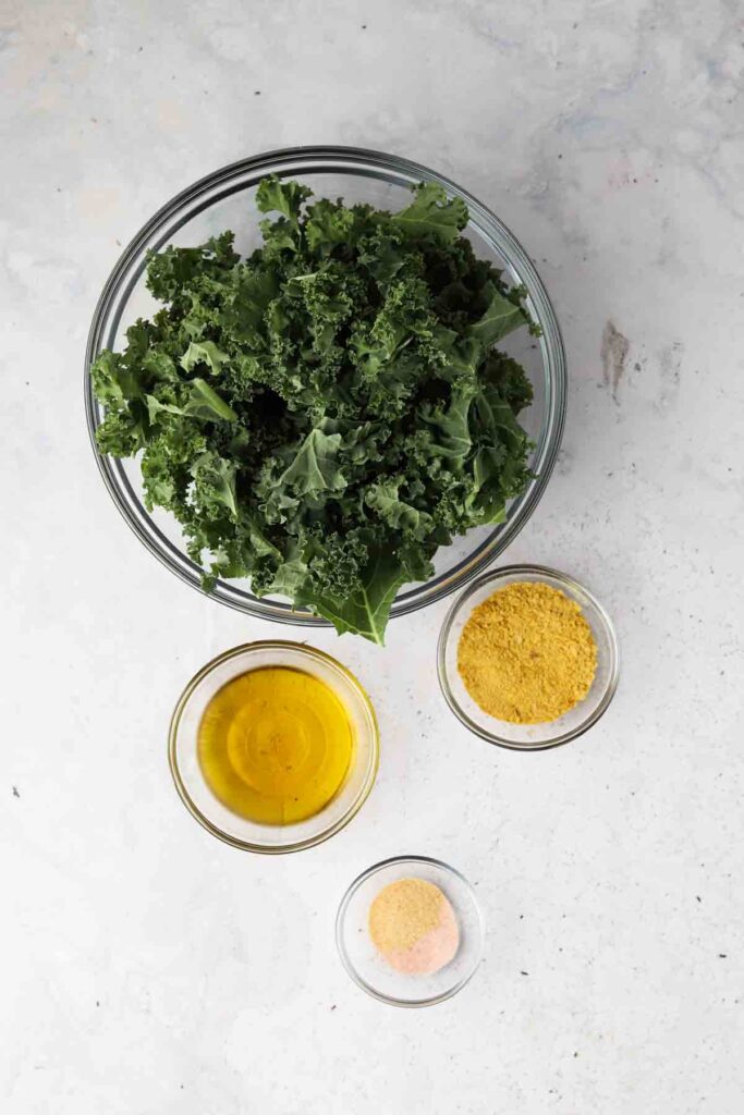 kale chip ingredients laid out in bowls