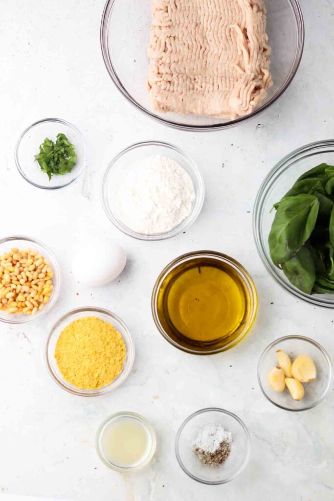 chicken meatball ingredients laid out in bowls