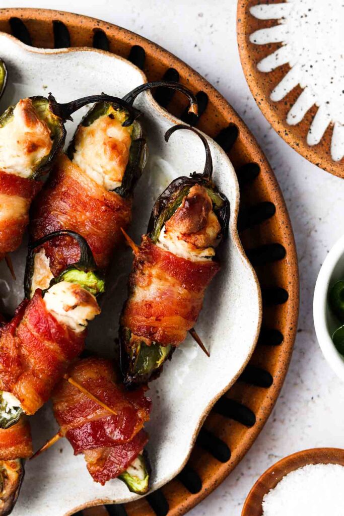 keto jalapeno poppers on a black and white plate