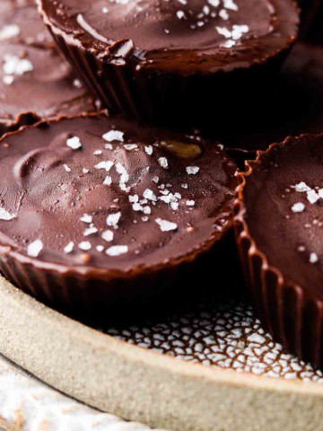 dairy free peanut butter cups stacked on a plate