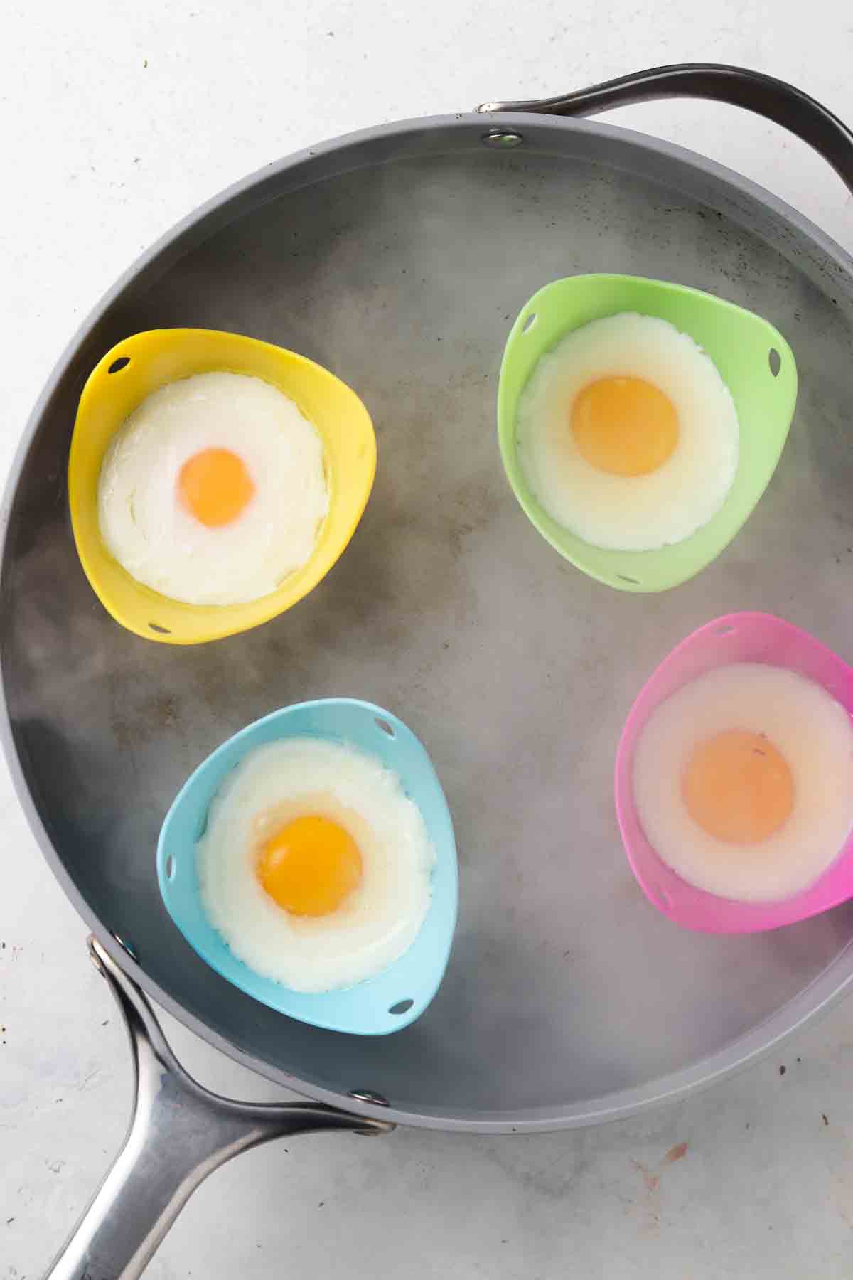 poached eggs in a pan