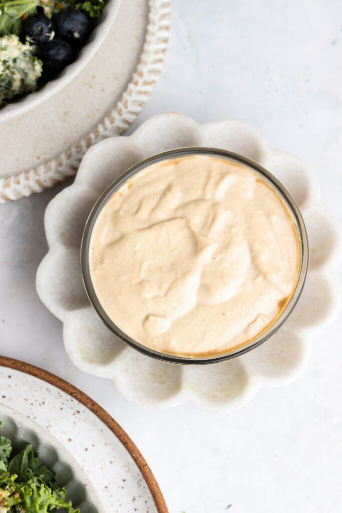 pretty blueberry kale salad dressing in a bowl