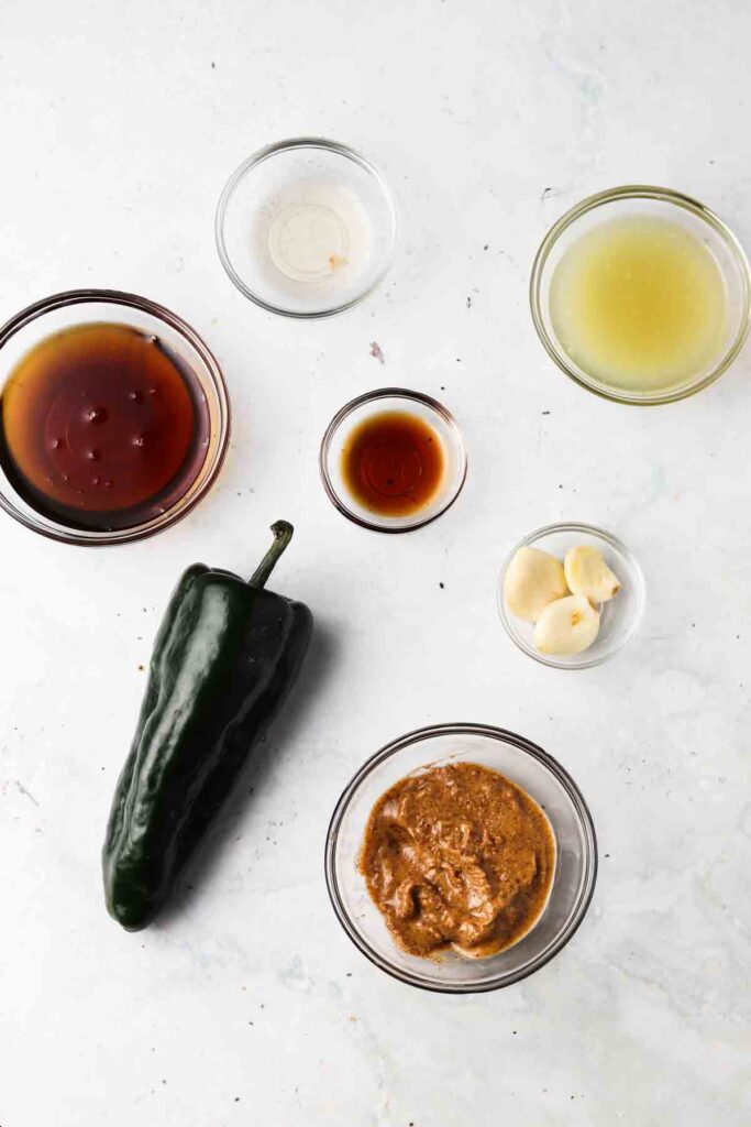 pad thai sauce ingredients laid out in bowls