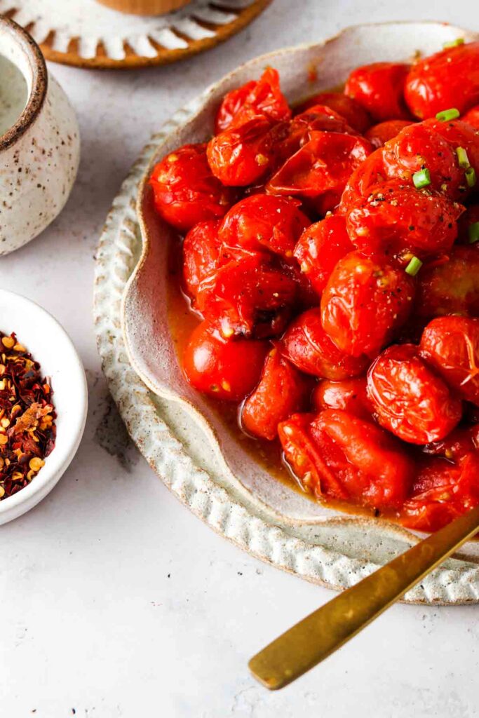 cherry tonatoes roasted in the air fryer on a plate