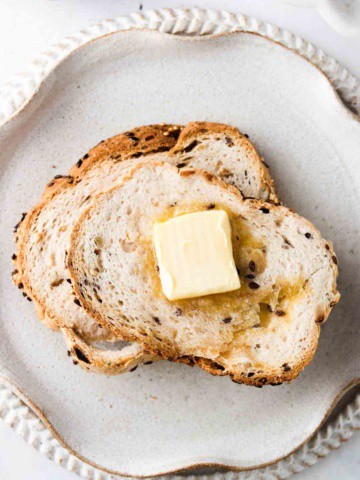 toast on a plate with butter