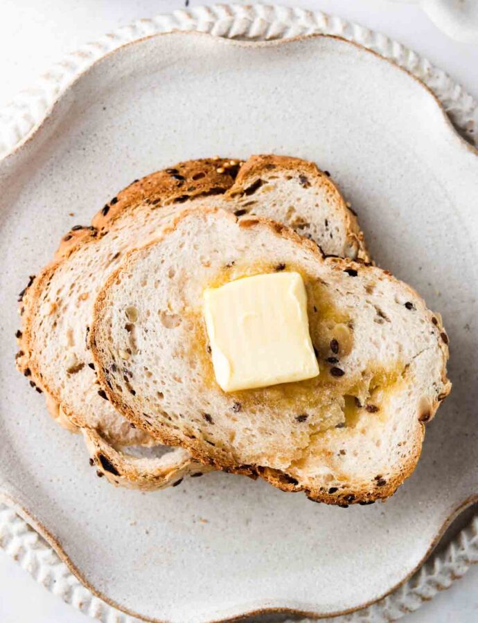 toast on a plate with butter