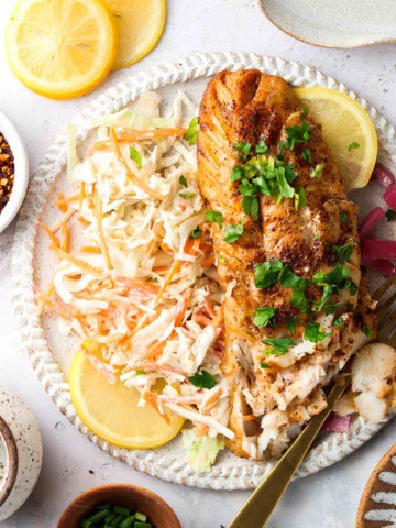 beautiful cajun cod on a plate