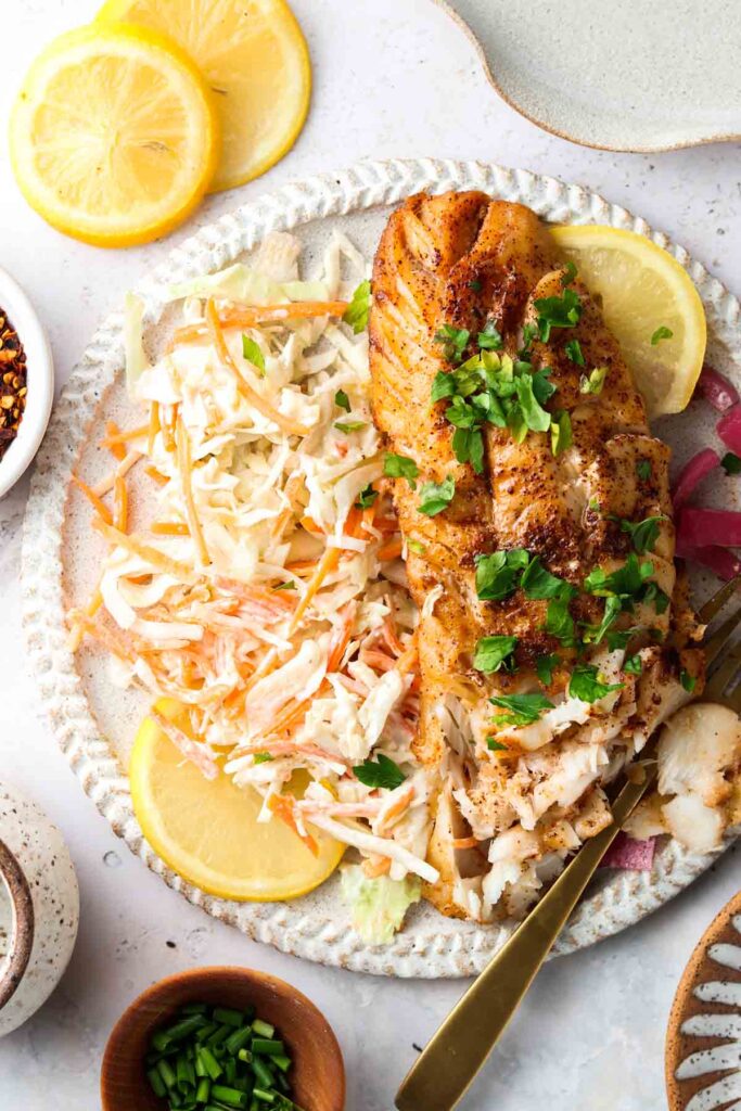 beautiful cajun cod on a plate