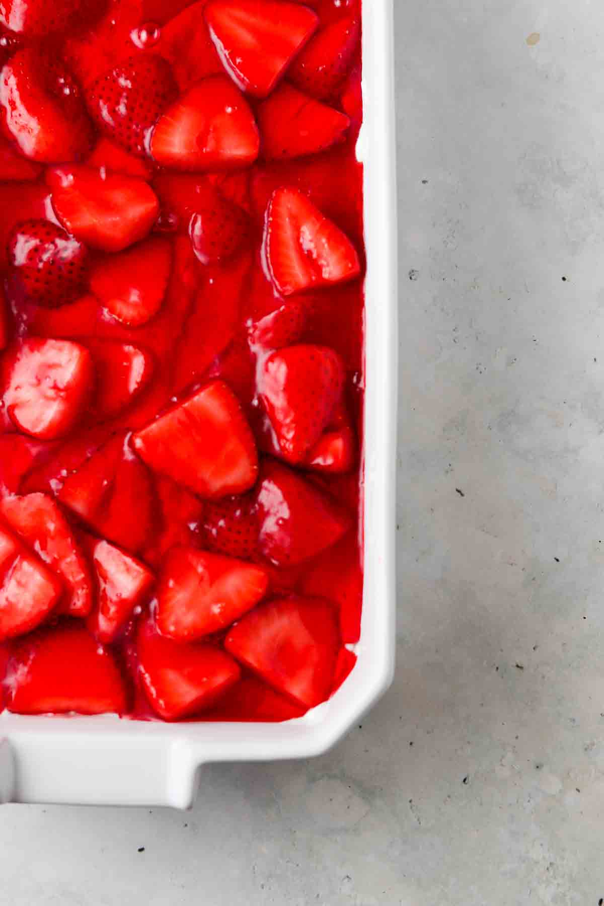 Strawberry jello layer poured on top.