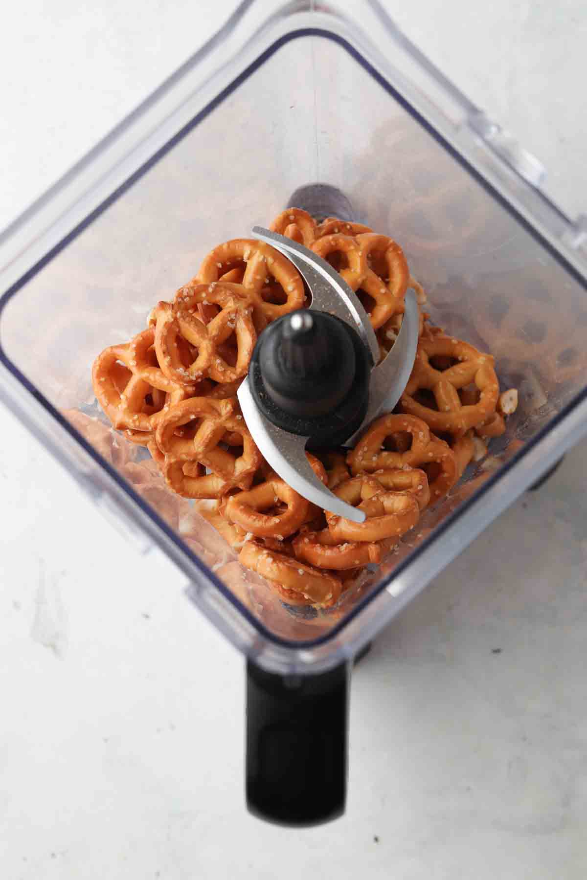 Gluten free pretzels in the food processor.