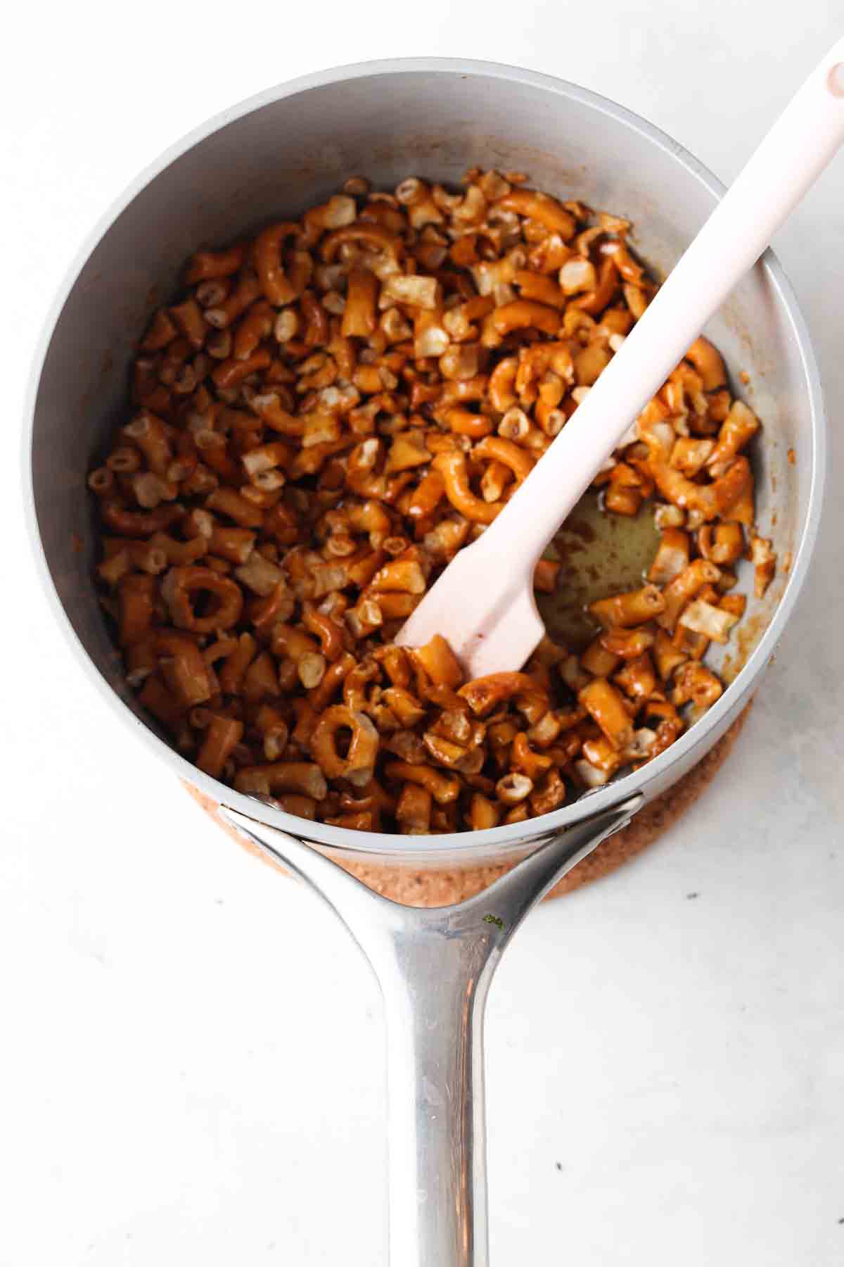 Pretzels mixed with coconut sugar and ghee.