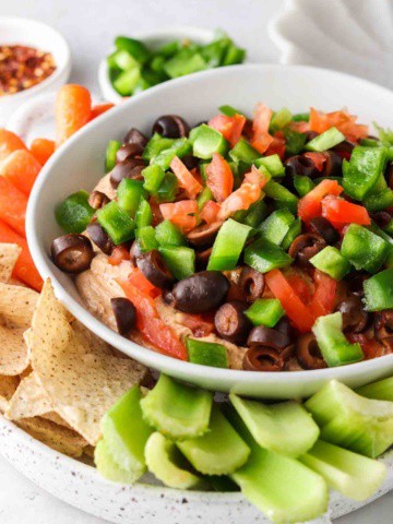 keto taco dip on a plate with celery