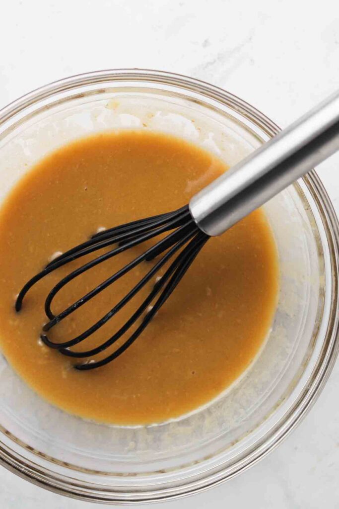 honey sauce whisked in a bowl