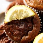 close up photo of poppyseed muffins on a plate