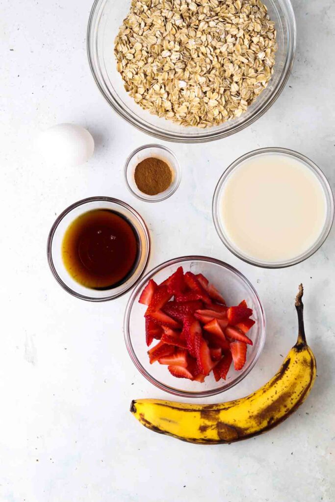 oat bar ingredients laid out in small bowls