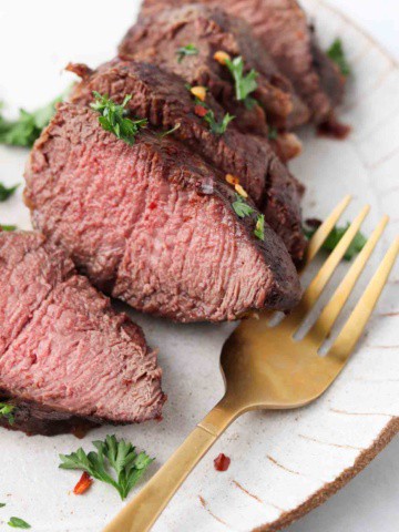 juicy filet mignon on a plate