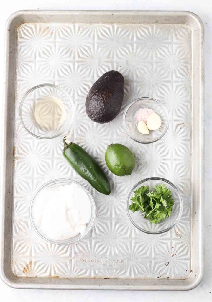 recipe ingredients laid out on a sheet pan