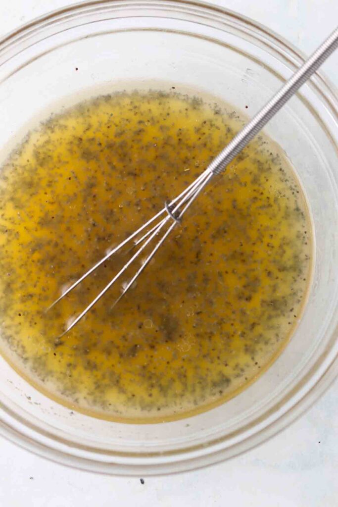 orange poppyseed dressing in a bowl