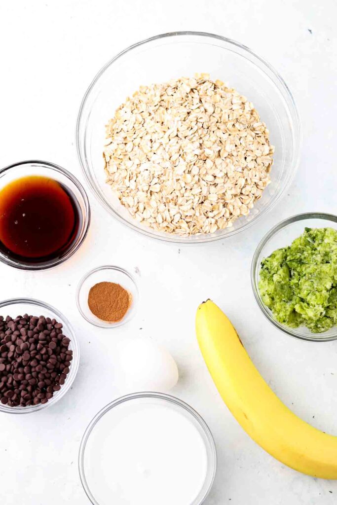 zucchini oat bar ingredients laid out in bowls