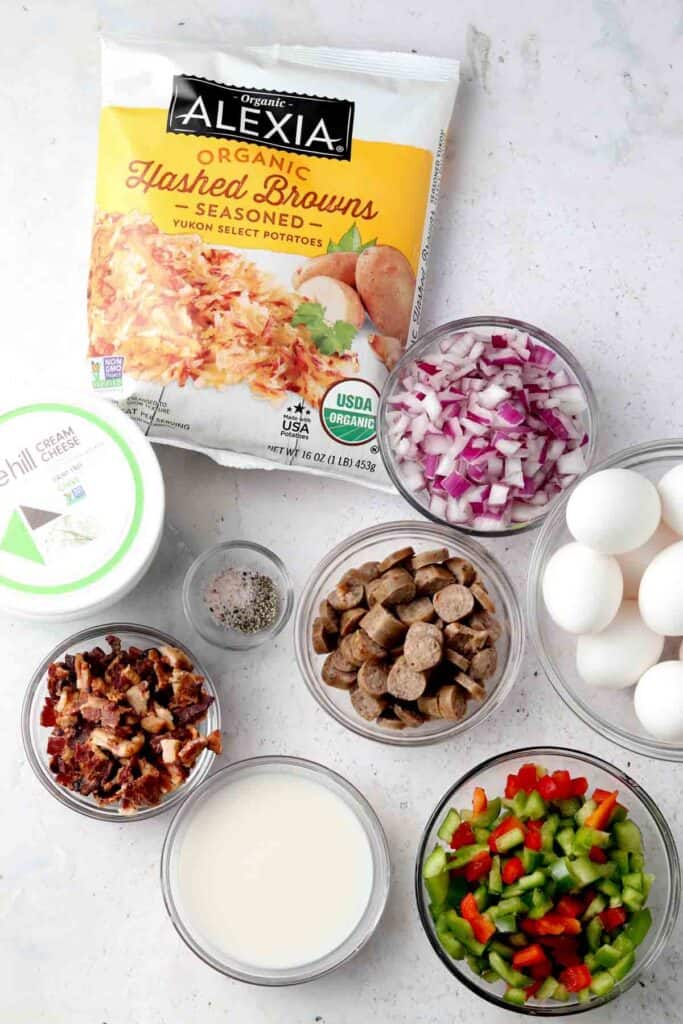 breakfast casserole ingredients laid out in bowls