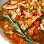 close up photo of turkey soup in a bowl