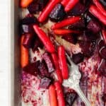 roasted beets and carrots on a sheet pan