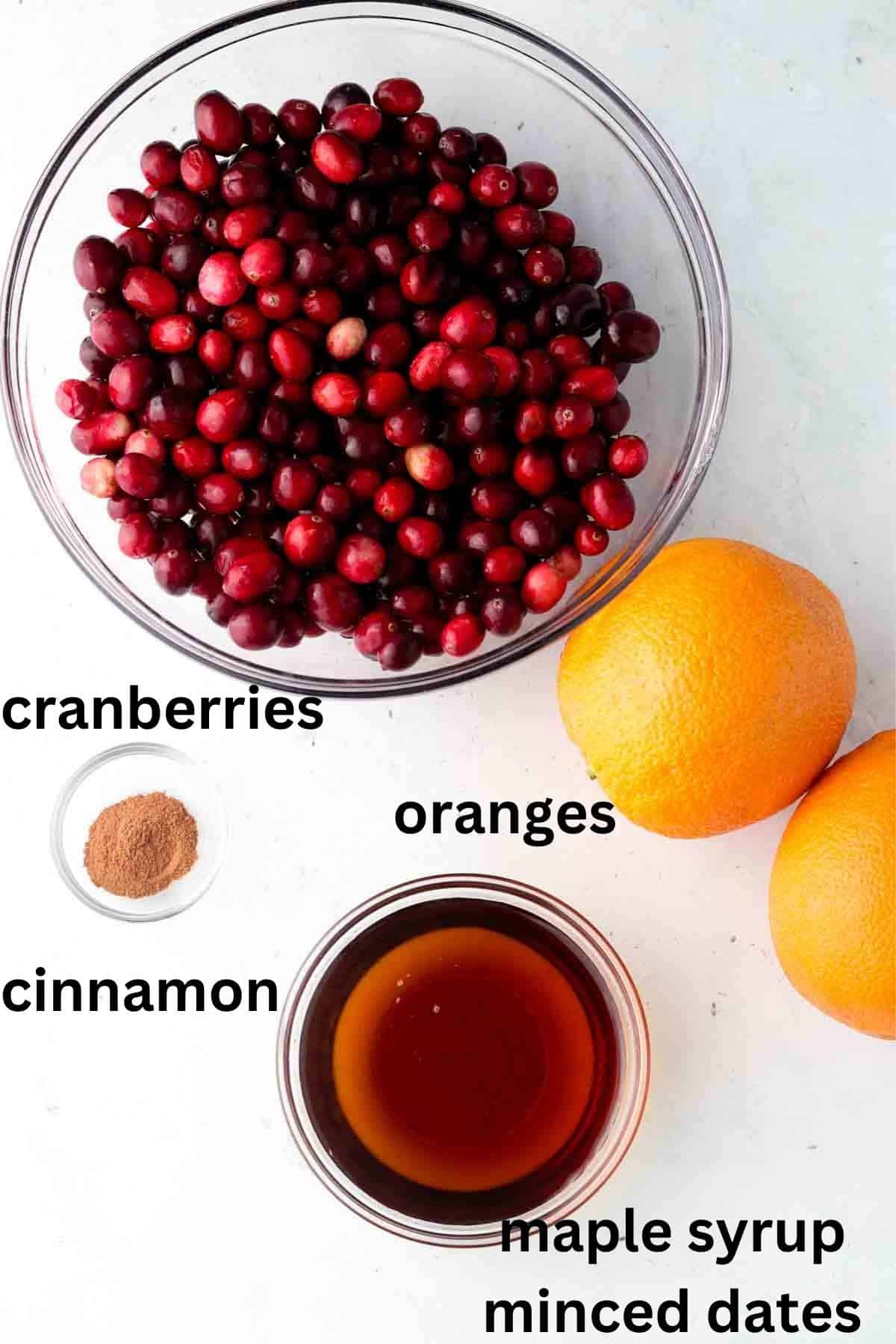 Whole30 cranbery sauce ingredients laid out in clear bowls.