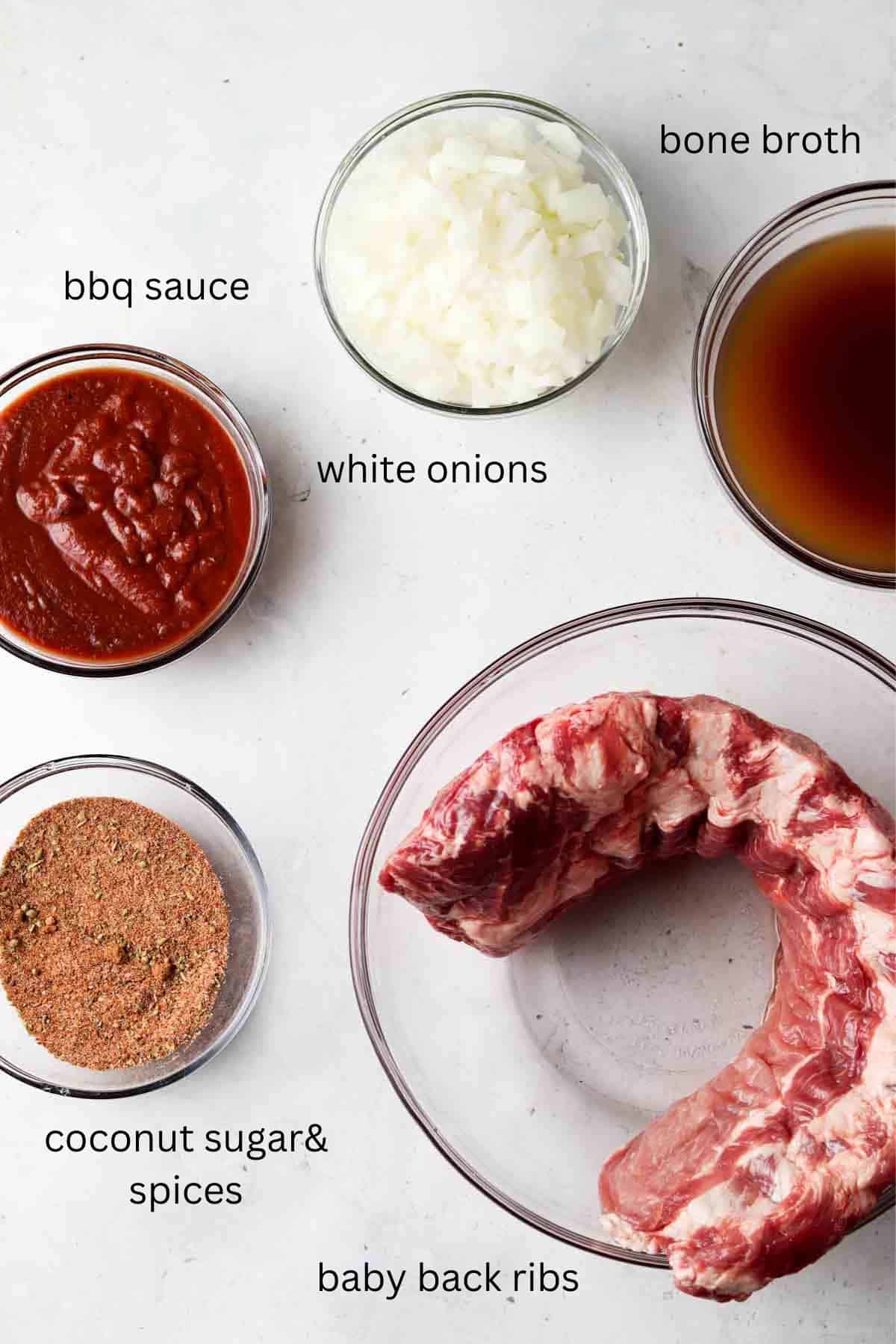 Rib ingredients laid out in small glass bowls.