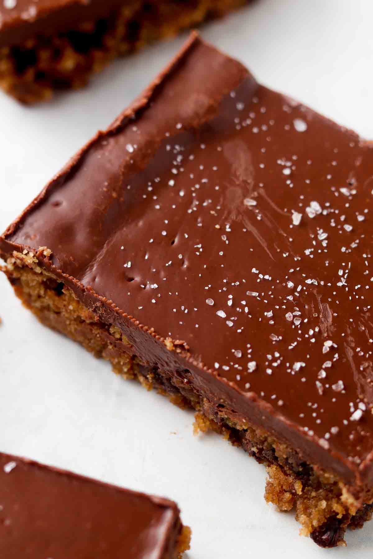 Gluten free cookie cake bar with chocolate fudge on top.