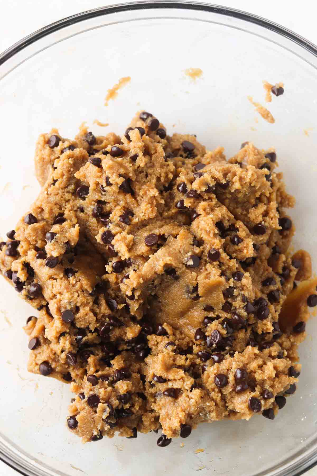 Mixed cookie dough in a bowl.