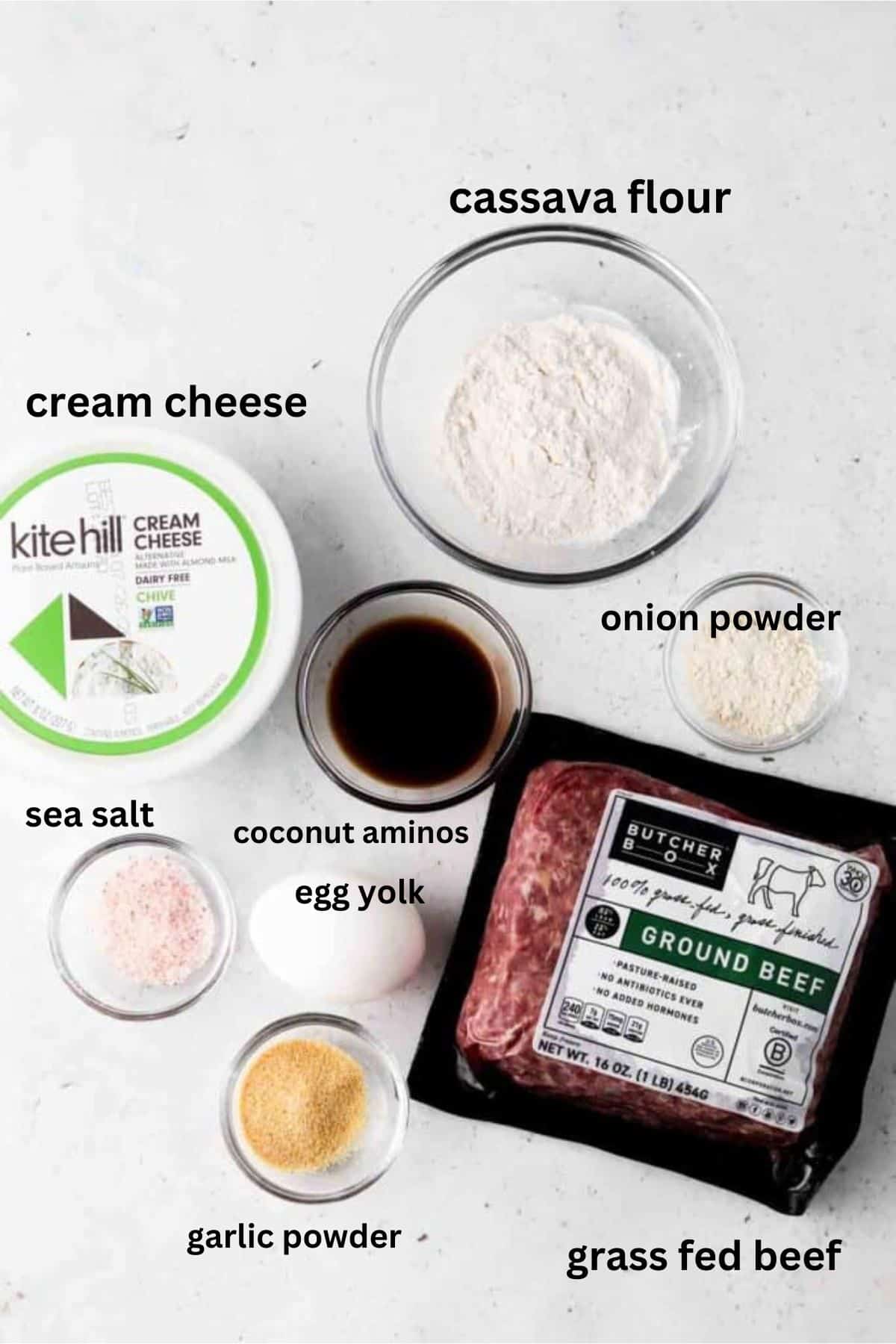 Gluten free burger ingredients in glass bowls.