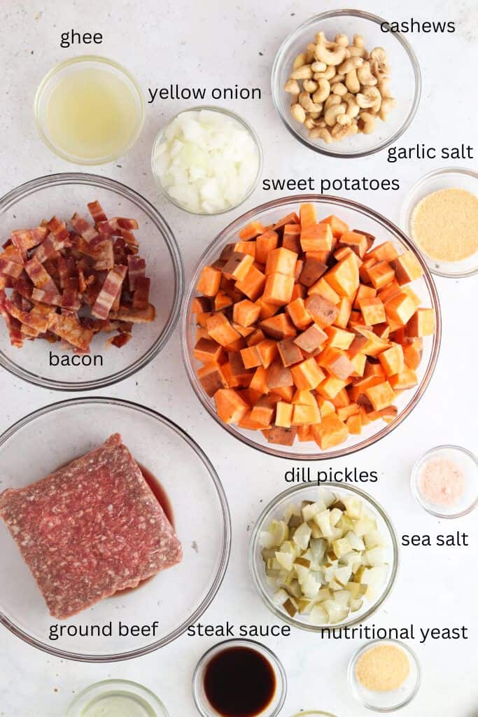 Casserole ingredients in glass bowls on a tabletop.