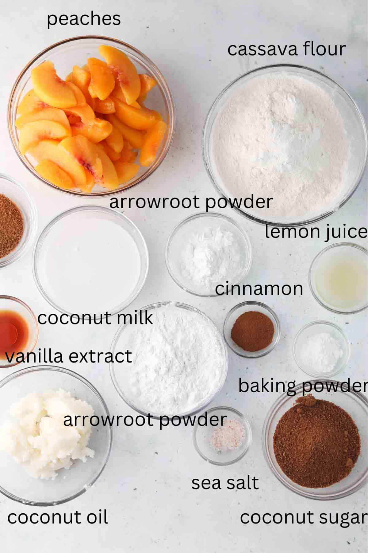 Ingredients for vegan peach cobbler in glass bowls on table with names of each item type on pictures.