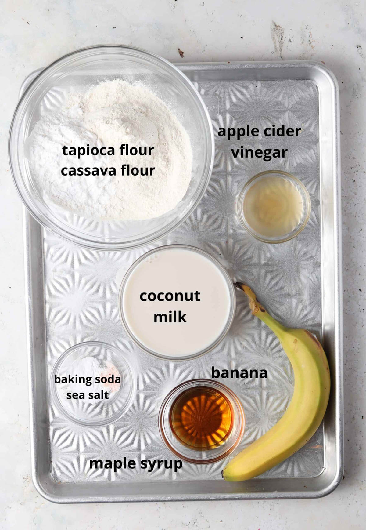 AIP pancake ingredients in small glass bowls on a silver plater. 