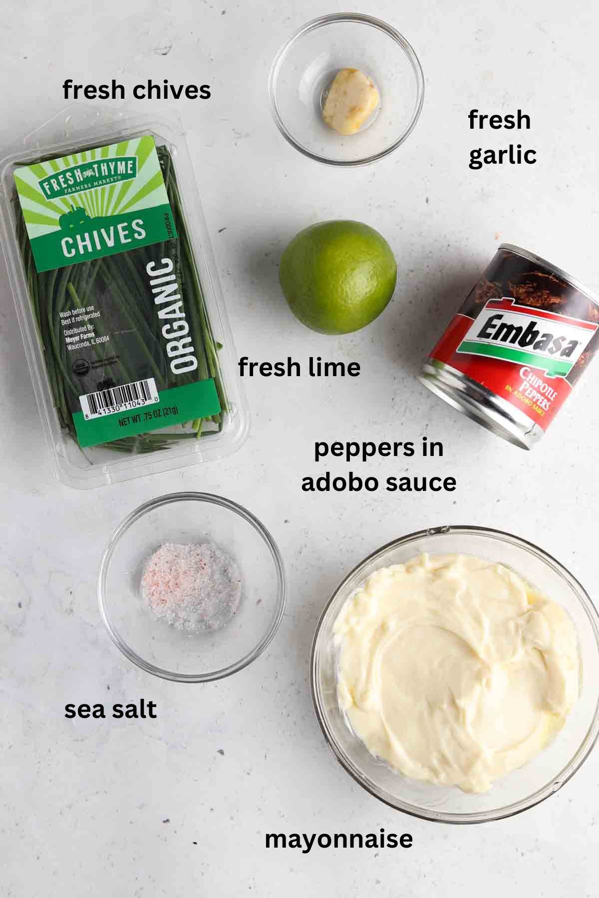 Breakfast burrito sauce ingredients in small glass bowls.