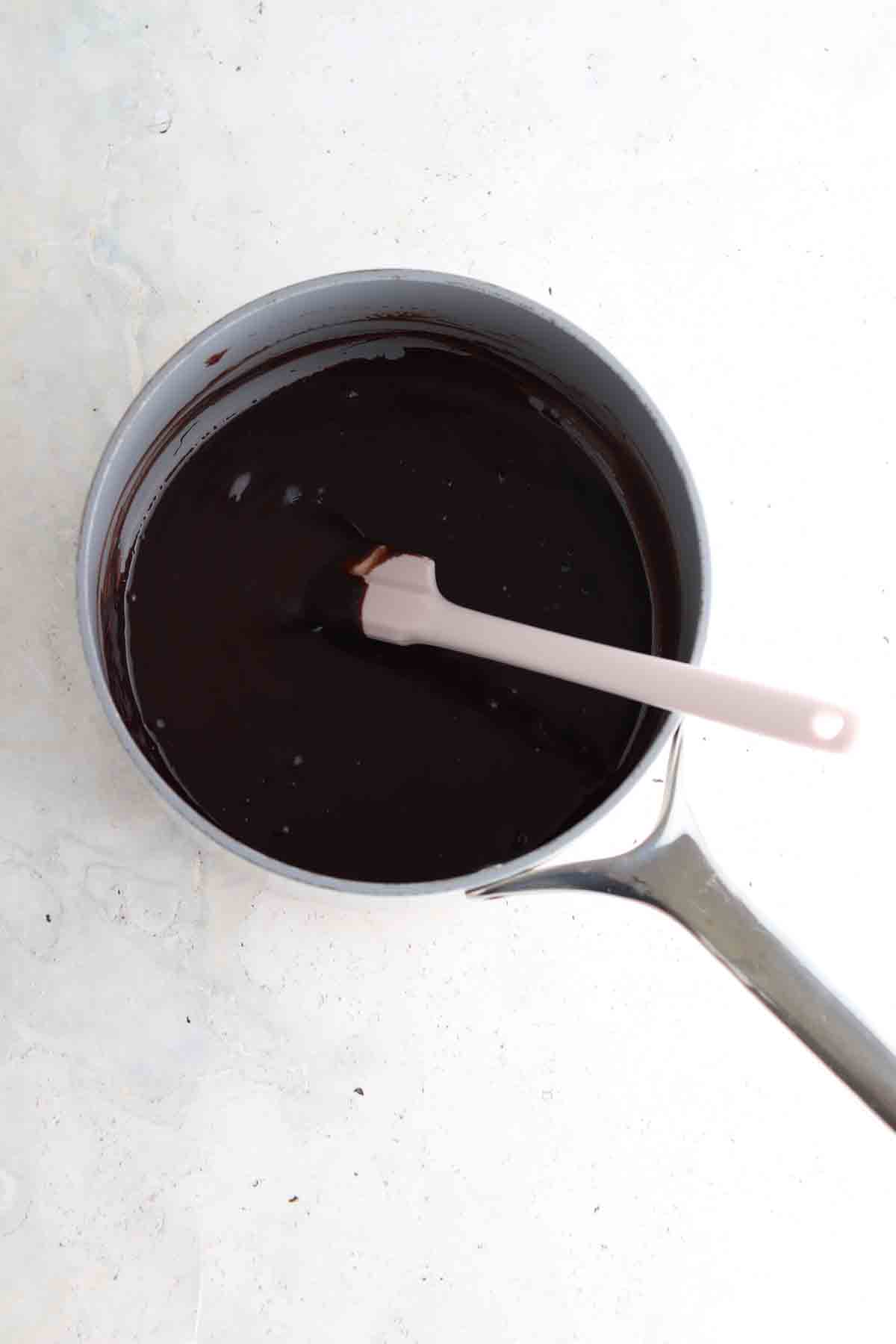 Chocolate and coconut milk in a large sauce pan.